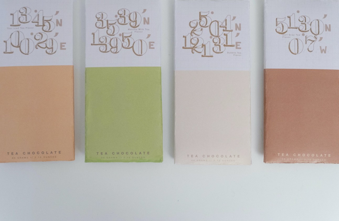 Chocolate Bar — four pastel tea-flavor wrappers fanned out on a white surface